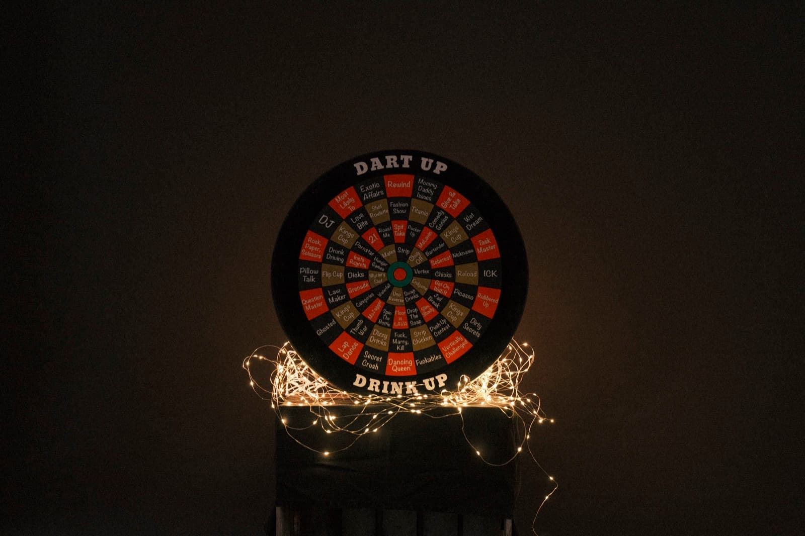 A dart mid-throw, closing in on the DartUp board's forfeit wedges